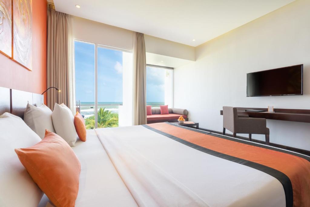 Двухместный (Улучшенный двухместный номер с 1 кроватью или 2 отдельными кроватями, вид на море; бесплатный обед) курортного отеля Citrus Waskaduwa, Калутара