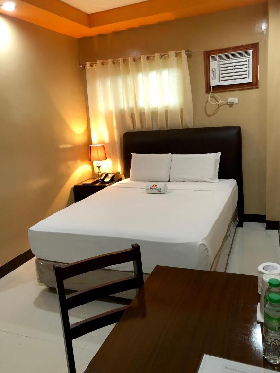 Двухместный (Стандартный двухместный номер с 1 кроватью) отеля Al-Raddadi Suites, Давао