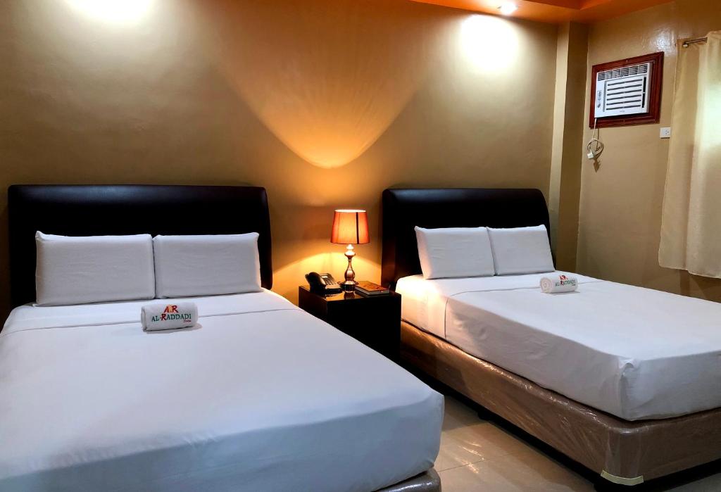 Двухместный (Двухместный номер Делюкс с 1 кроватью) отеля Al-Raddadi Suites, Давао