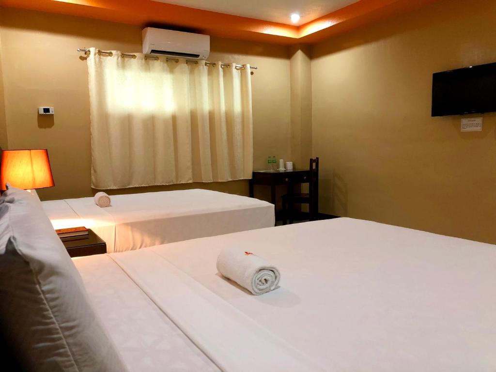 Сьюит (Улучшенный люкс) отеля Al-Raddadi Suites, Давао