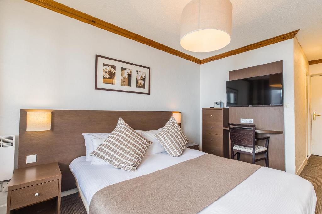 Двухместный (Стандартный двухместный номер с 1 кроватью или 2 отдельными кроватями) отеля Madame Vacances Hôtel Le Mottaret***, Мерибель