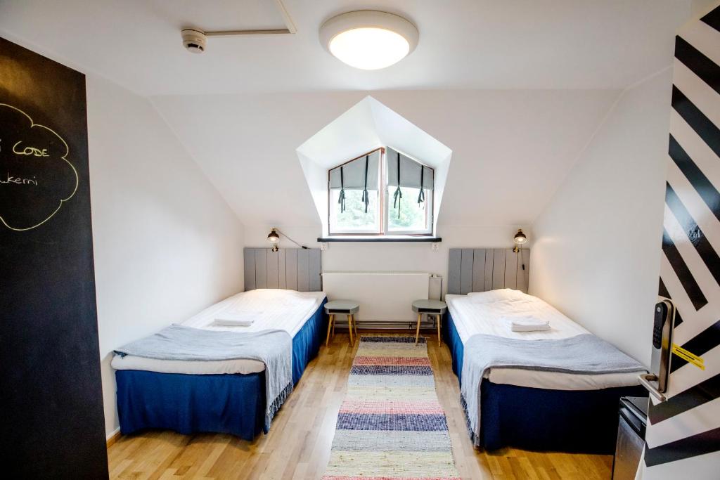 Двухместный (Двухместный номер с 2 отдельными кроватями и общей ванной комнатой) хостела Hostel Villa Kemi, Кеми (Лаппи)