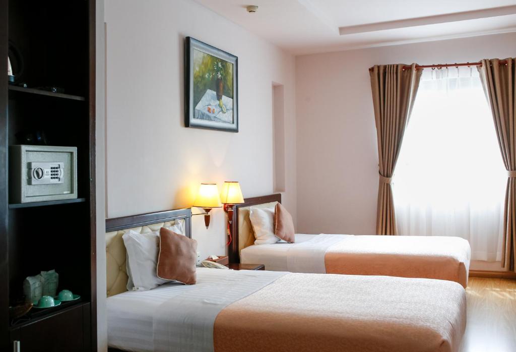 Двухместный (Двухместный номер Делюкс с 2 отдельными кроватями) отеля Chau Pho Hotel, Чаудок