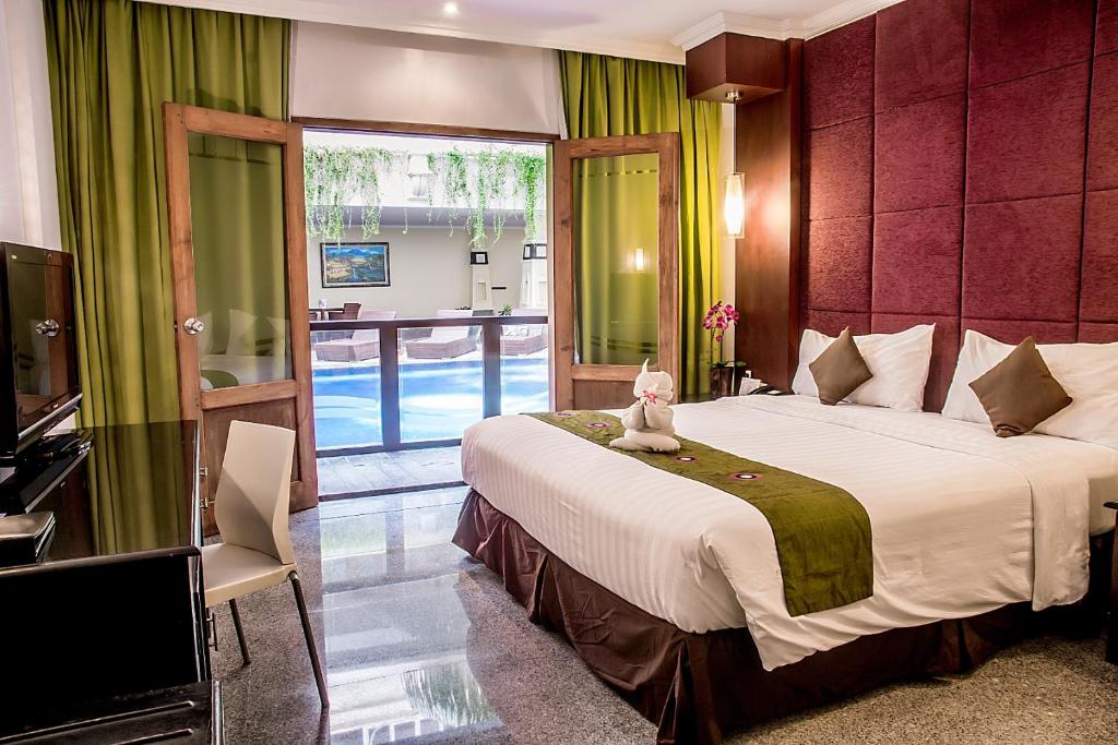 Двухместный (Двухместный номер Делюкс с 1 кроватью или 2 отдельными кроватями, доступ к бассейну) отеля Permata Kuta Hotel, Кута