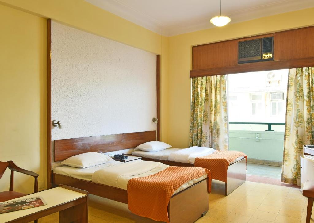 Двухместный (Двухместный номер с 1 кроватью или 2 отдельными кроватями) отеля Sea Green Hotel, Мумбай
