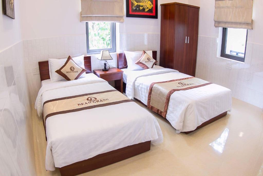 Двухместный (Двухместный номер Делюкс с 1 кроватью или 2 отдельными кроватями и балконом) семейного отеля Bean Grass Homestay, Хойан