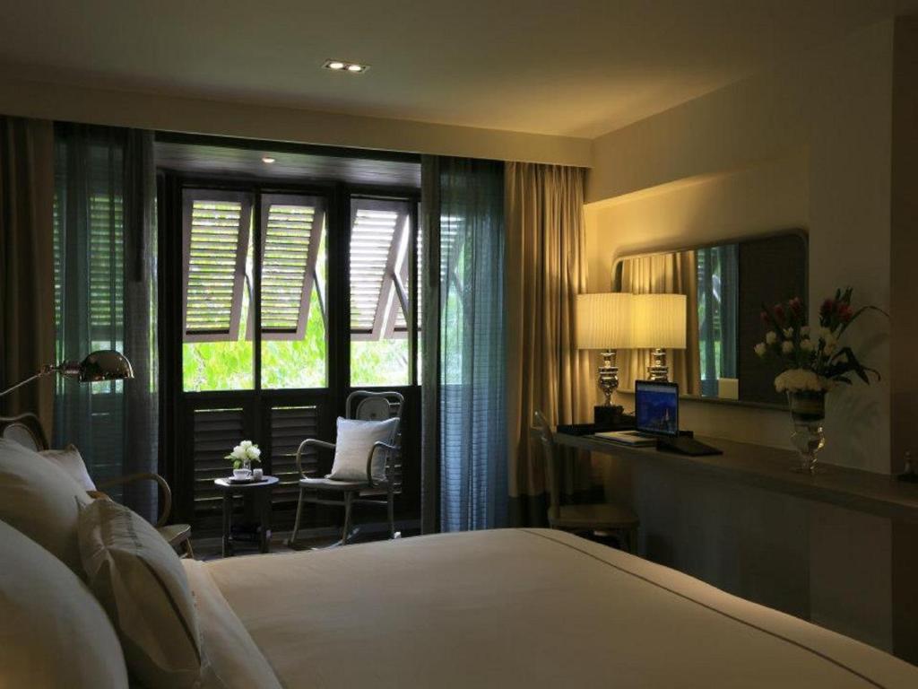 Двухместный (Специальное предложение Staycation - Стандартный двухместный номер с 1 кроватью или 2 отдельными кроватями, балконом и видом на город) отеля Riva Surya Bangkok, Бангкок