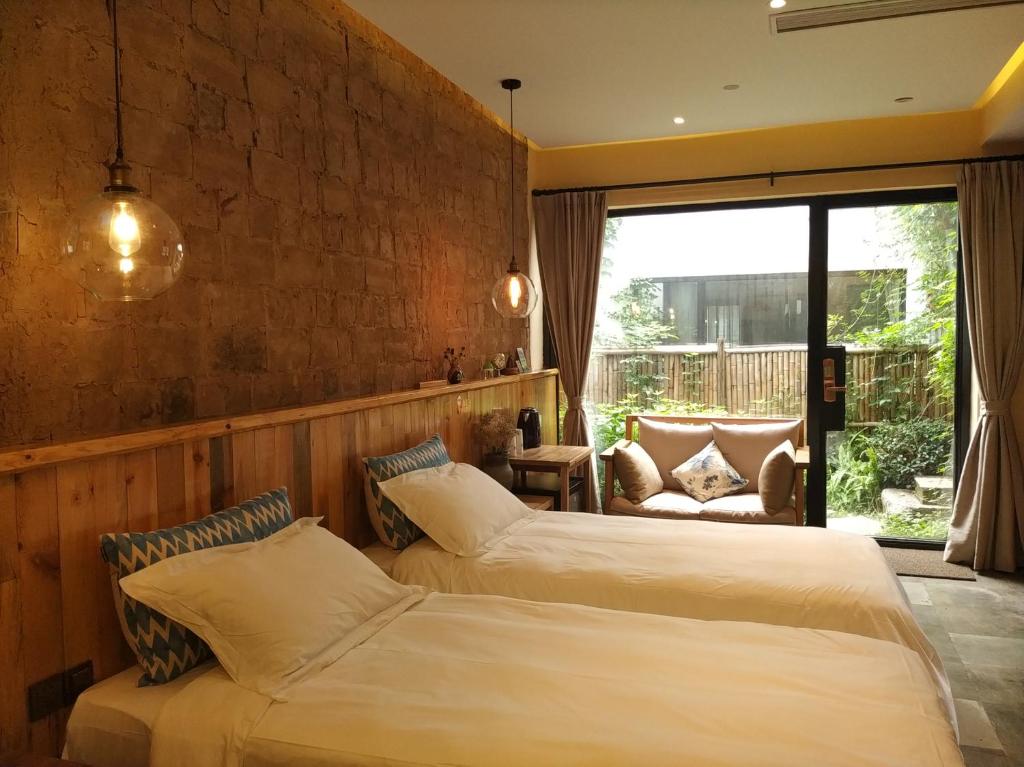 Двухместный (Двухместный номер с 2 отдельными кроватями и ванной) семейного отеля Youxiake Canal Hotel Hangzhou, Ханчжоу