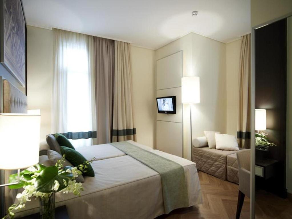 Двухместный (Улучшенный двухместный номер с 2 отдельными кроватями) отеля Menelaion Hotel, Спарта