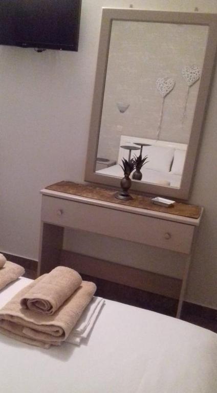 Двухместный (Стандартный двухместный номер с 1 кроватью или 2 отдельными кроватями, вид на море) гостевого дома Maltezos Rooms, Метана