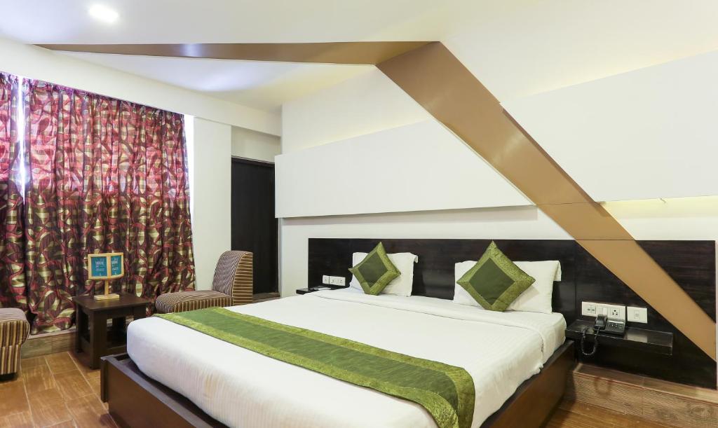 Двухместный ([Sanitized] Superior Double Room) отеля Treebo Edge, Бангалор