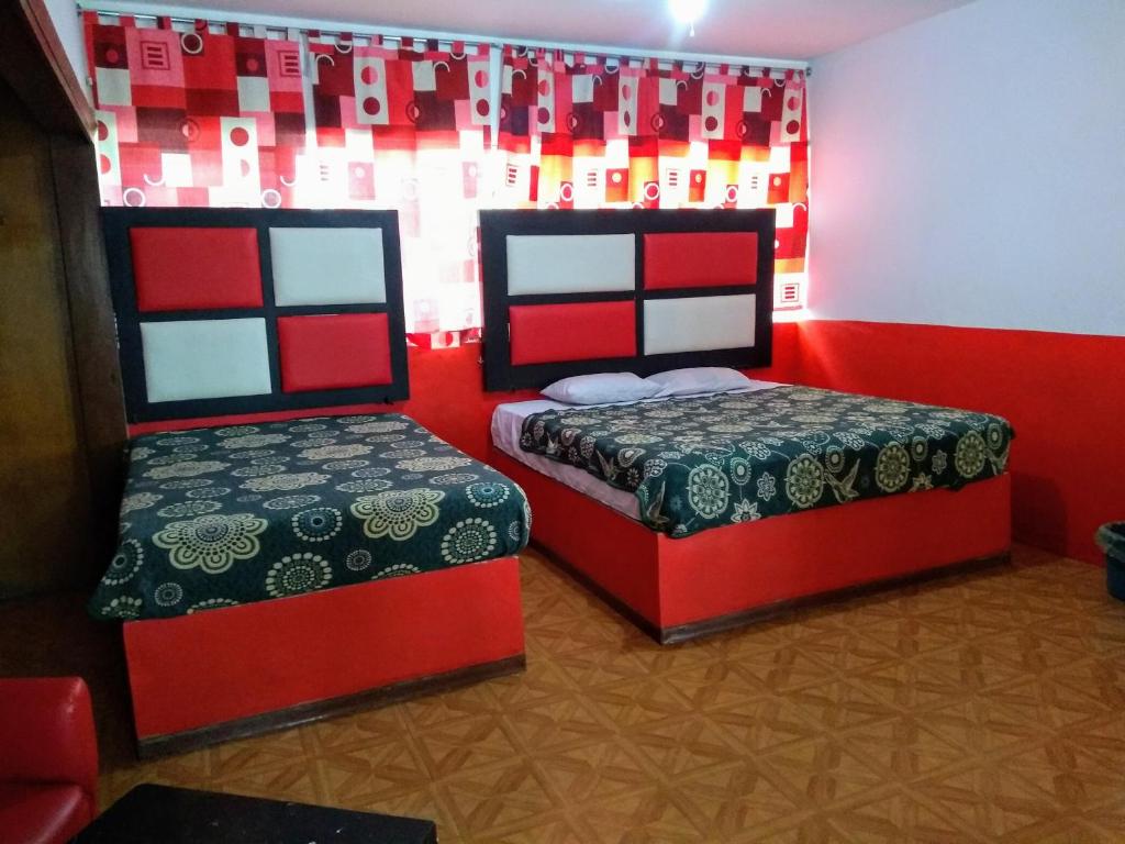 Двухместный (Просторный двухместный номер с 2 отдельными кроватями) отеля Hotel Real de Obregon, Куэрнаваки