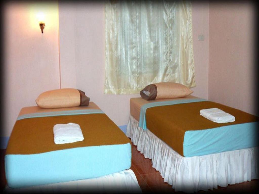 Двухместный (Стандартный двухместный номер с 1 кроватью или 2 отдельными кроватями и кондиционером) гостевого дома D's Corner & Guesthouse, Пхукет