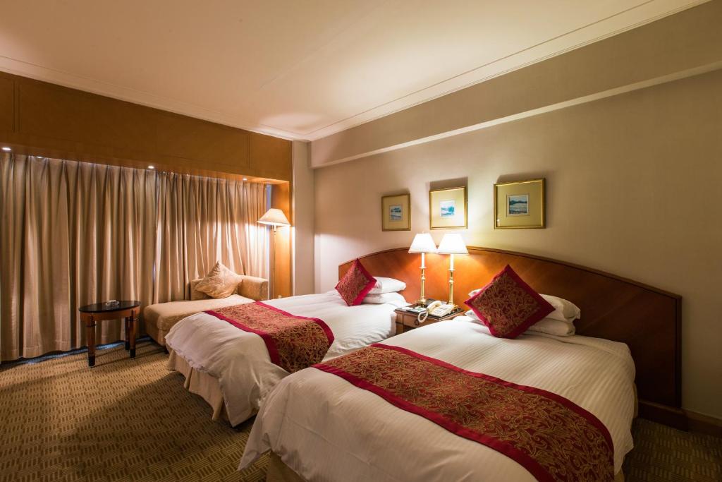 Двухместный (Стандартный двухместный номер с 2 отдельными кроватями) отеля Dalian Swish Hotel, Далянь
