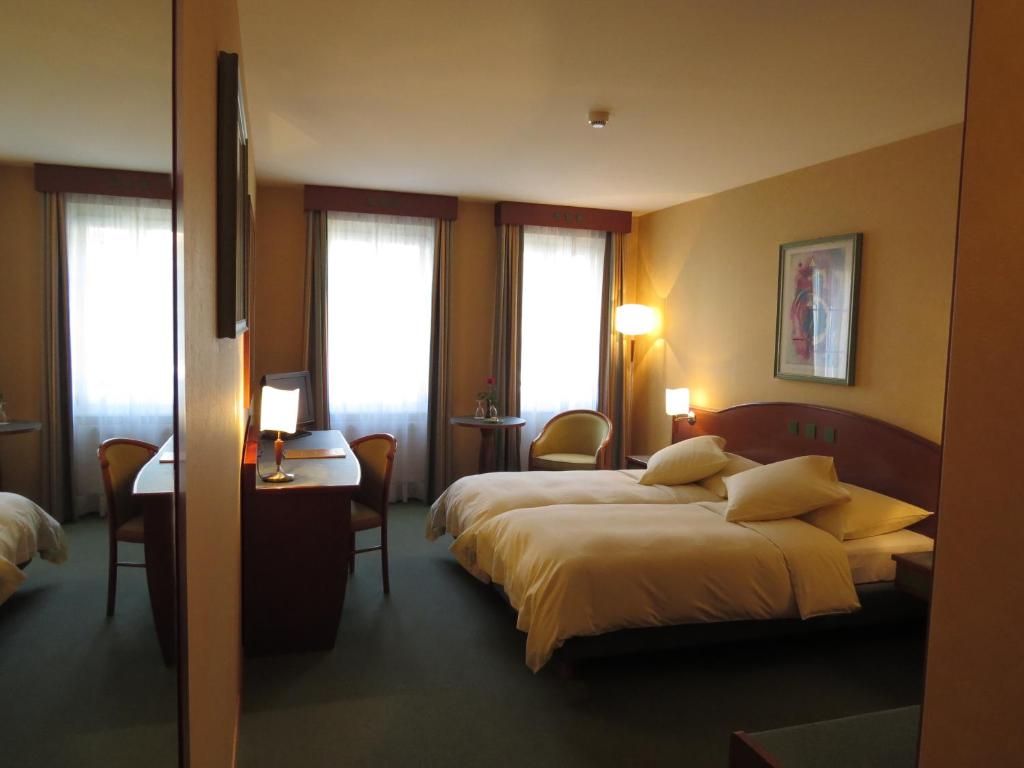 Двухместный (Двухместный номер с 2 отдельными кроватями) отеля Hôtel du Port, Лозанна