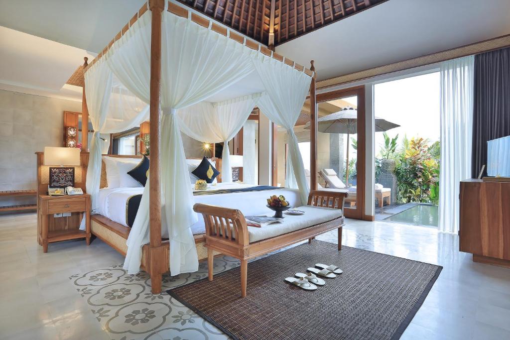 Вилла (Вилла люкс с бассейном) курортного отеля The Sankara Suites & Villas by Pramana, Убуд