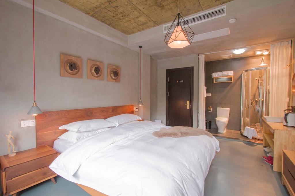 Двухместный (Двухместный номер с 1 кроватью, вид на сад), Hangzhou Yushu Hostel