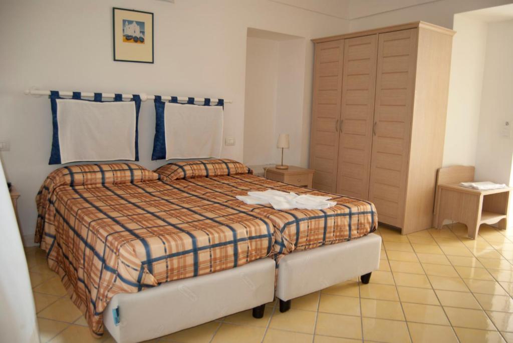 Двухместный (Двухместный номер с 1 кроватью или 2 отдельными кроватями) отеля Albergo Villa Giusto, Искья