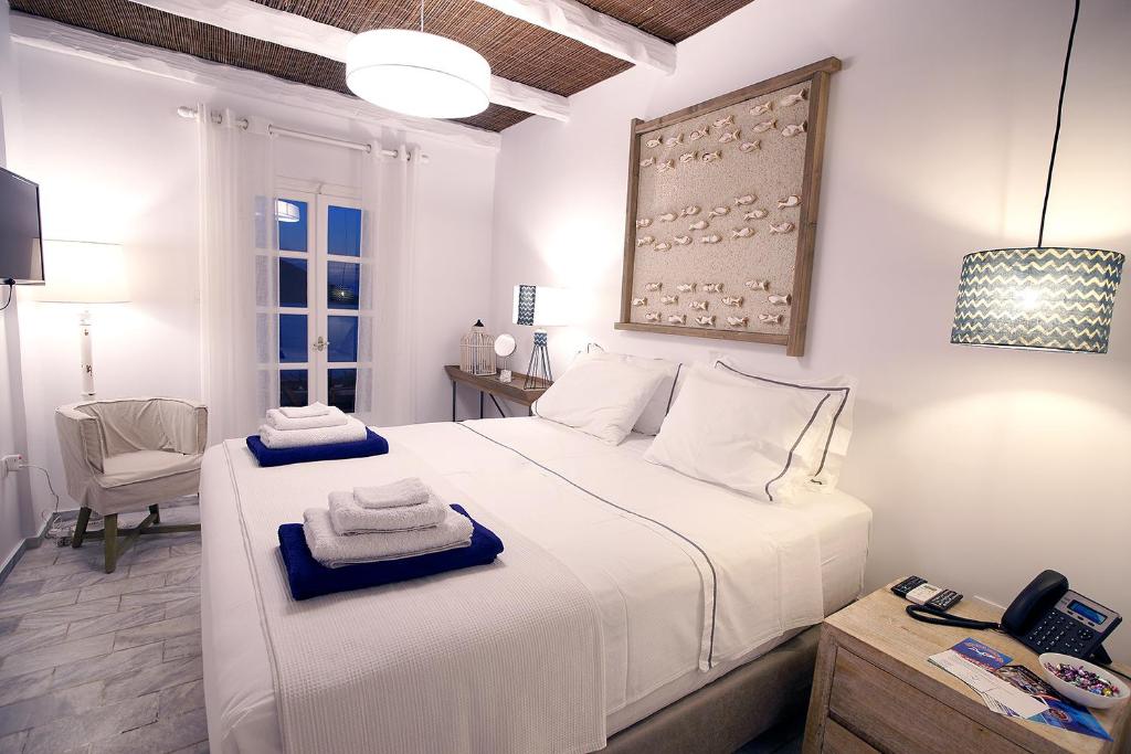 Двухместный (Двухместный номер Делюкс с 1 кроватью или 2 отдельными кроватями и видом на море) гостевого дома La Playa Boutique Apartments, Масурион