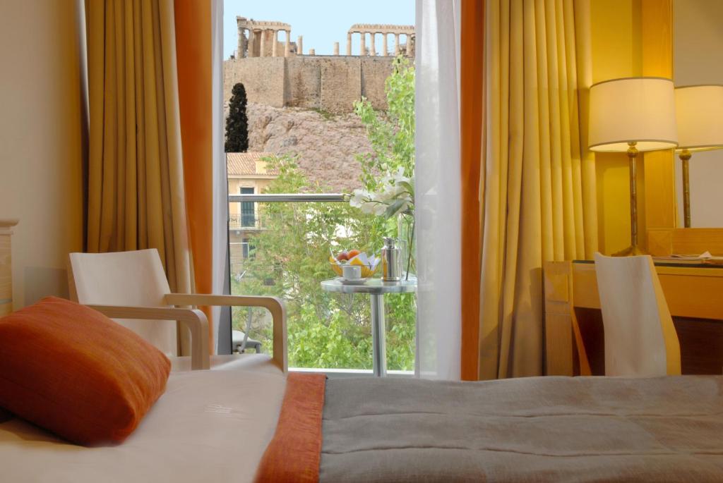 Двухместный (Улучшенный двухместный номер с 1 кроватью или 2 отдельными кроватями, вид на Акрополь  ) отеля Herodion Hotel, Афины