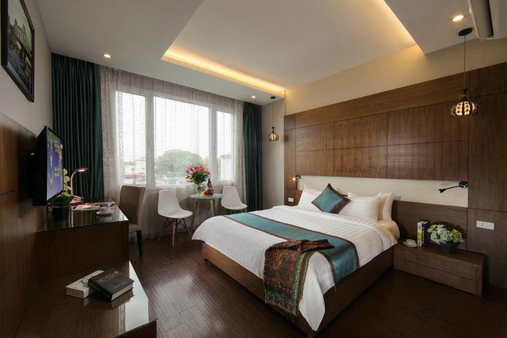 Двухместный (Двухместный номер Делюкс с 1 кроватью или 2 отдельными кроватями, вид на город) отеля Bonne Nuit Hotel & Spa, Ханой