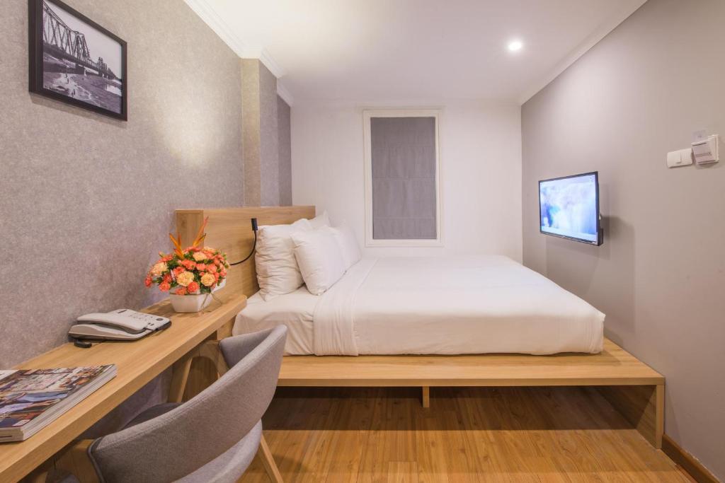 Двухместный (Улучшенный двухместный номер с 1 кроватью или 2 отдельными кроватями) отеля Rising Dragon Villa Hotel, Ханой
