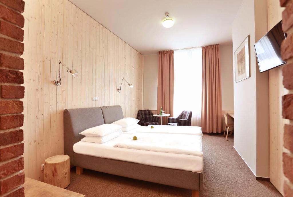 Двухместный (Улучшенный двухместный номер с 2 отдельными кроватями) отеля Absolutum, Прага