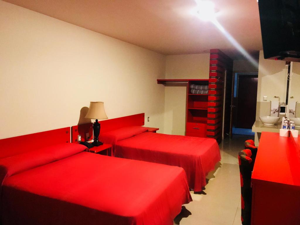 Двухместный (Двухместный номер с 2 отдельными кроватями) отеля Hotel Palacio Rojo, Морелия