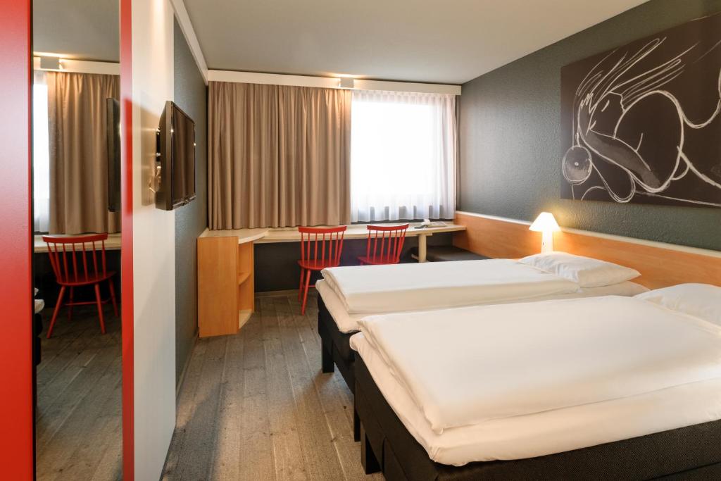 Двухместный (Стандартный двухместный номер с 2 отдельными кроватями) отеля Ibis Wien Mariahilf, Вена