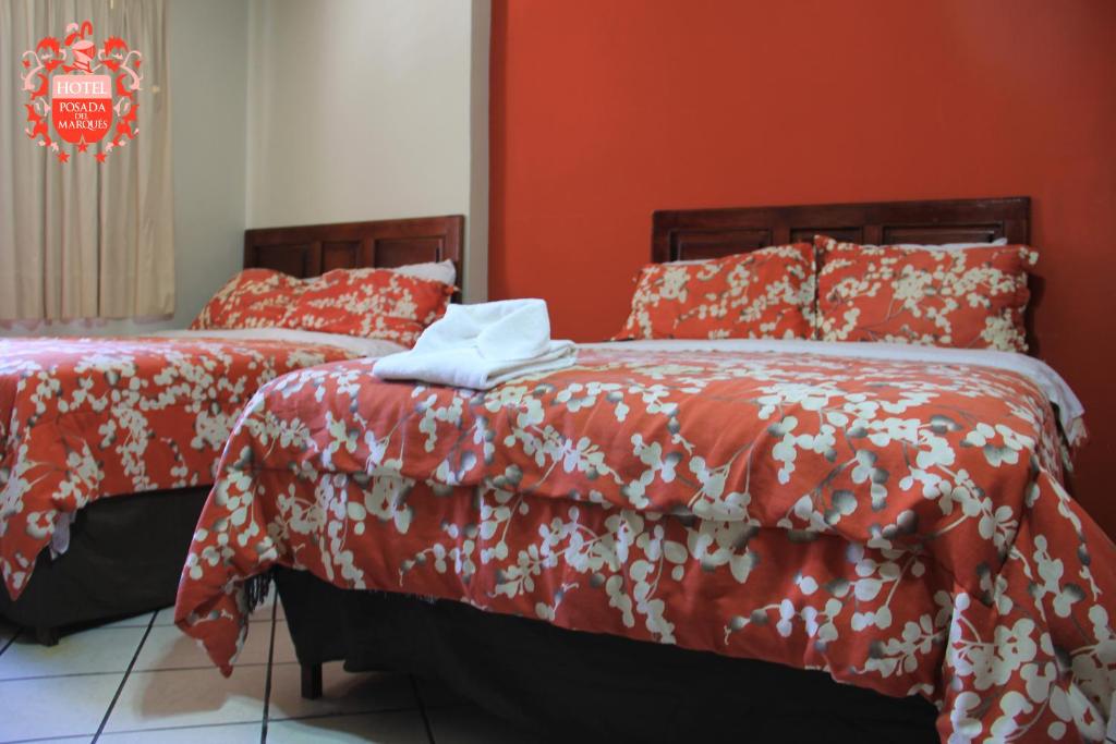 Двухместный (Двухместный номер с 2 двуспальными кроватями) отеля Posada del Marqués, Сан-Хуан-де-лос-Лагос
