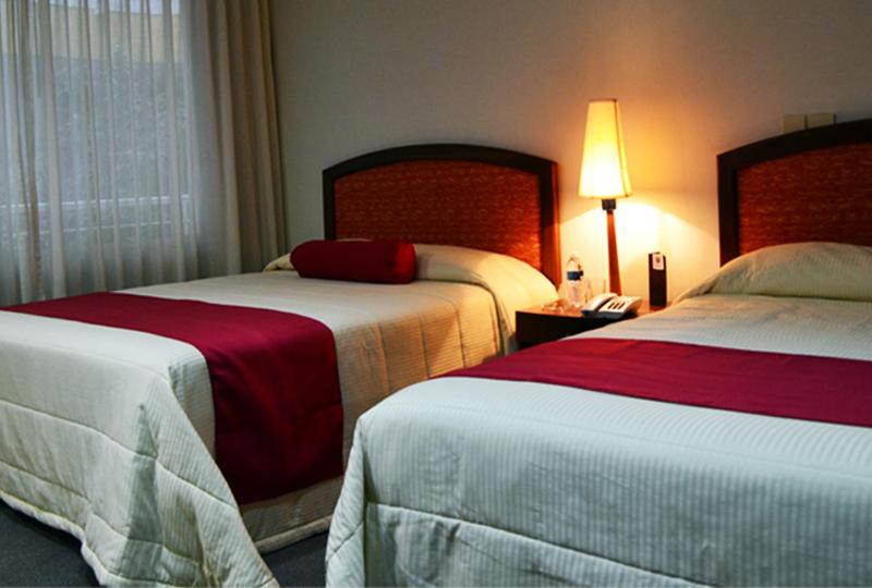 Двухместный (Двухместный номер с 2 отдельными кроватями) отеля Hotel Mediterraneo Sa De Cv, Тулансинго