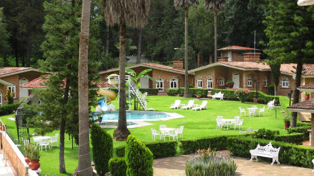 Вилла (Вилла с 3 спальнями и видом на сад (для 6 взрослых)) отеля Hotel Villa Monarca Inn, Ситакуаро