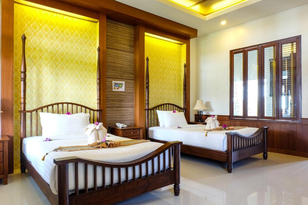 Двухместный (Двухместный номер Делюкс с 1 кроватью или 2 отдельными кроватями и видом на озеро) курортного отеля Bhu Tarn Koh Chang Resort & Spa, Ко Чанг