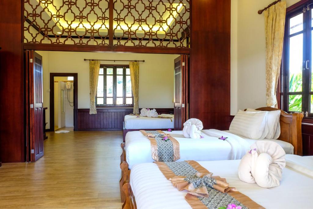 Двухместный (Двухместный номер Делюкс с 1 кроватью или 2 отдельными кроватями и видом на бассейн) курортного отеля Bhu Tarn Koh Chang Resort & Spa, Ко Чанг