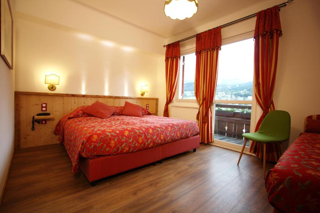 Двухместный (Двухместный номер с 1 кроватью или 2 отдельными кроватями) отеля Hotel Trieste, Кортина-д'Ампеццо