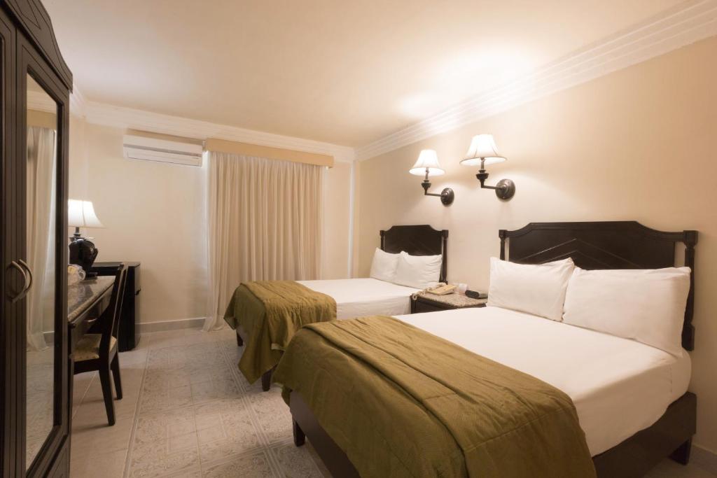 Двухместный (Двухместный номер с 1 кроватью или 2 отдельными кроватями) отеля Hotel Victoria Merida, Мерида