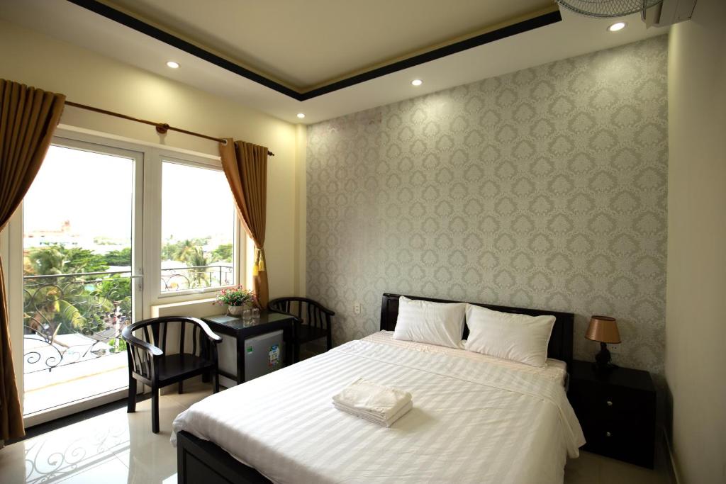 Двухместный (Двухместный номер Делюкс с 1 кроватью и видом на море) отеля An Phat Hotel, Кондао