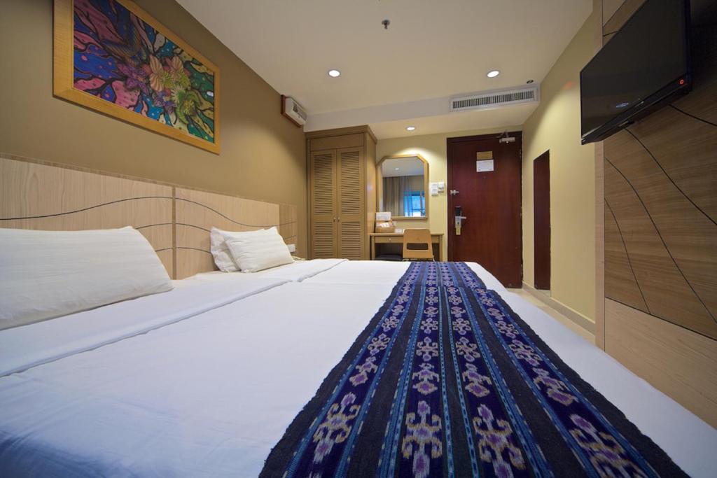 Двухместный (Двухместный номер Делюкс с 2 отдельными кроватями) отеля Kinabalu Daya Hotel, Кота-Кинабалу