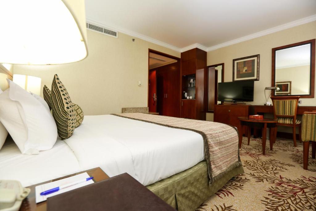 Двухместный (Стандартный двухместный номер с 1 кроватью или 2 отдельными кроватями) отеля Ramee Royal Hotel, Дубай