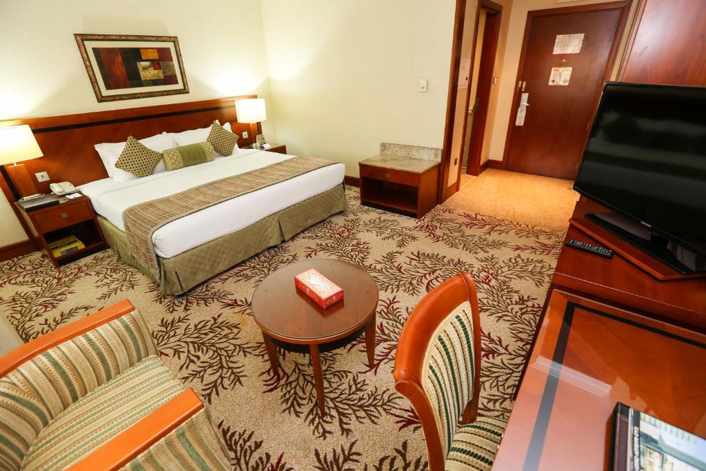 Отель Ramee Royal Hotel