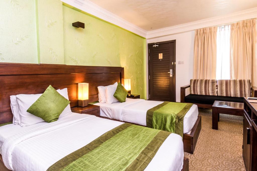 Двухместный (Двухместный номер Делюкс с 2 отдельными кроватями) отеля Ceylon City Hotel,Colombo, Коломбо