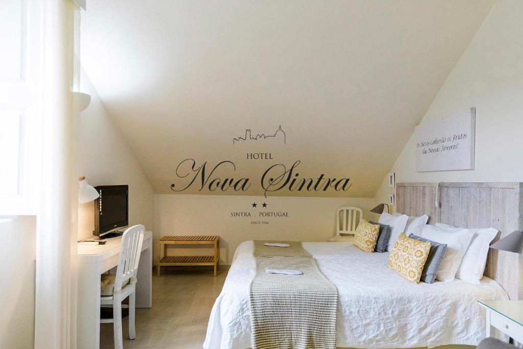 Двухместный (Двухместный номер с 2 отдельными кроватями - Мансарда) отеля Hotel Nova Sintra, Синтра