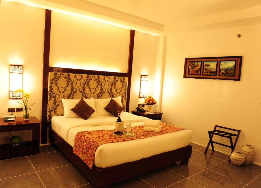 Двухместный (Номер Делюкс с кроватью размера «king-size») курортного отеля Boracay Summer Palace Hotel, Боракай