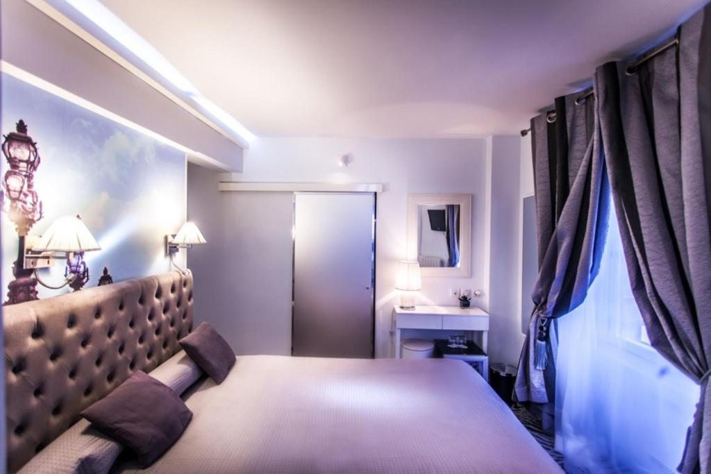 Двухместный (Улучшенный одноместный или двухместный номер с 1 кроватью и душем) отеля Hotel Ascot Opera, Париж
