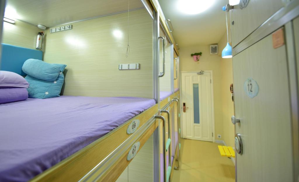Номер (Односпальная кровать в общем номере - Qingshan) хостела Qingting Space Capsule Hostel, Циндао