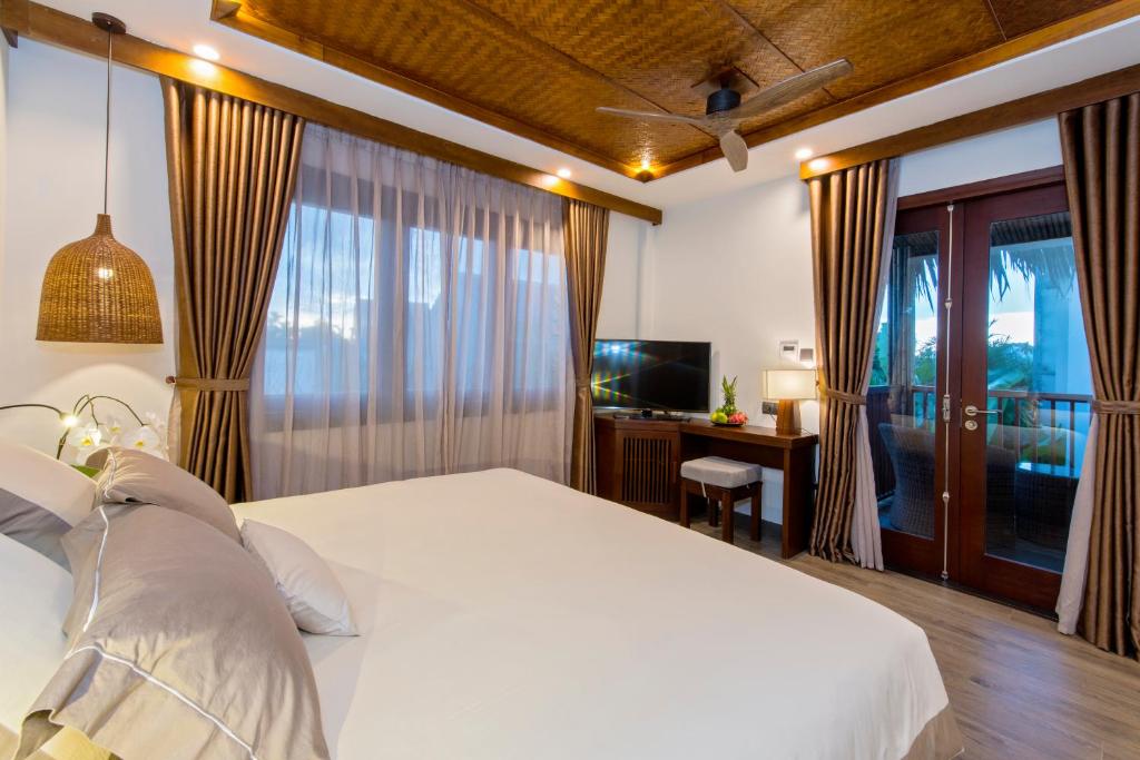 Двухместный (Двухместный номер Делюкс с 1 кроватью или 2 отдельными кроватями, вид на сад) курортного отеля Hoi An Eco Lodge & Spa, Хойан