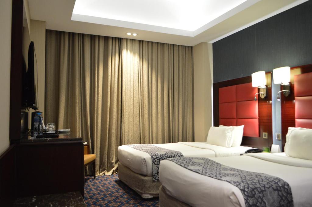 Двухместный (Бюджетный двухместный номер с 2 отдельными кроватями) отеля Ramee Guestline Hotel, Маскат