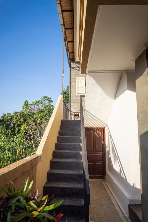 Двухместный (Двухместный номер Делюкс с 1 кроватью), Umah Tikari Guesthouse