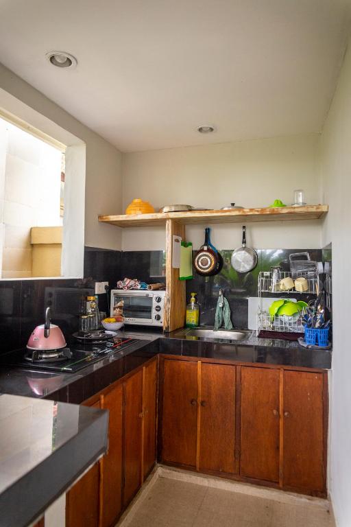 Двухместный (Двухместный номер Делюкс с 1 кроватью), Umah Tikari Guesthouse