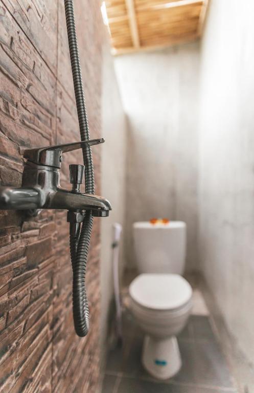 Двухместный (Двухместный номер Делюкс с 1 кроватью), Umah Tikari Guesthouse